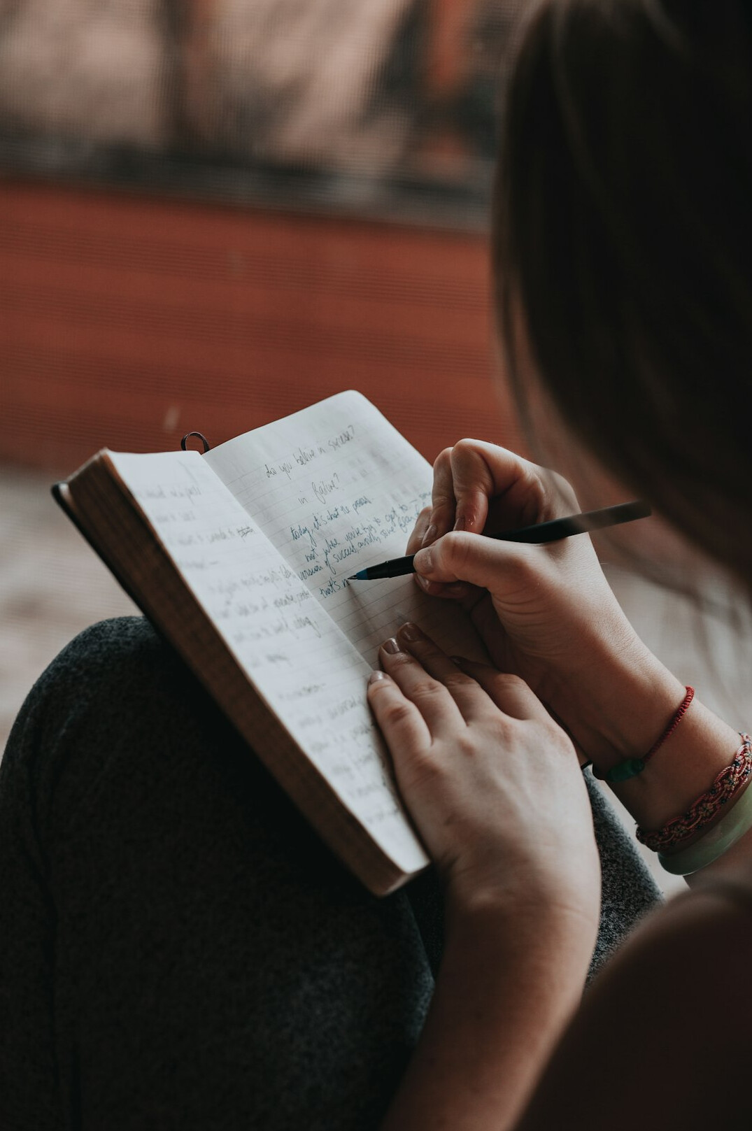 writer planning story on paper